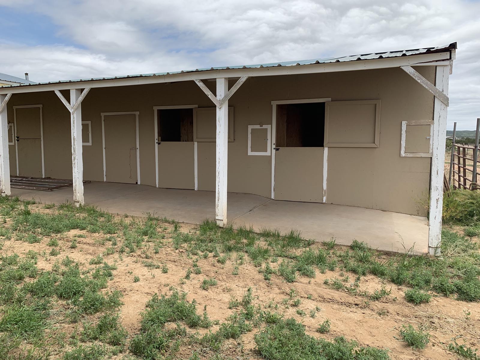 Shedrow Barn at Tiger Owl Ranch horse boarding facility in Santa Fe, New Mexico