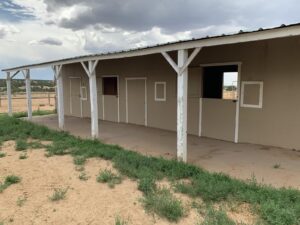 Stalls at Tiger Owl Ranch horse boarding facility in Santa Fe, New Mexico